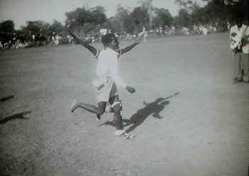 Queens' coronation celebrations in Mwinilunga, Northern Rhodesia - the three-legged race.