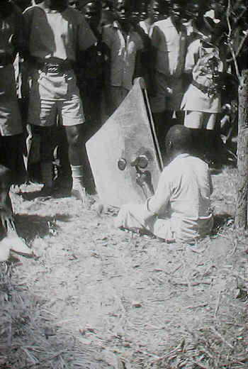 Queens' coronation celebrations in Mwinilunga, Northern Rhodesia - Chief's drummer.
