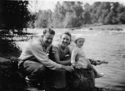 Tim and Betty Dening with their daughter Katherine, by the Lunga River.