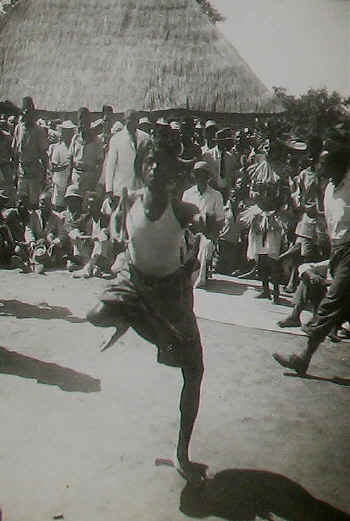 Queens' coronation celebrations in Mwinilunga, Northern Rhodesia - Hunting dance..